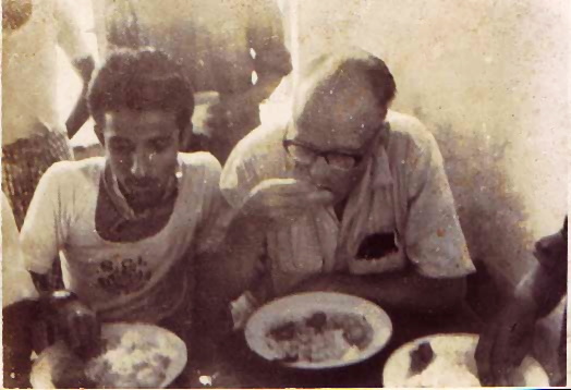 Faruque and Ralph Hegnauer havingLunch at the Blind School week-end camp at Dhaka (1966)